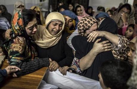 Women mourned the death of a 15-year-old boy in the Taliban attack.
