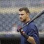 Boston Red Sox third baseman Will Middlebrooks waits to bat before a baseball game against the Minnesota Twins in Minneapolis, Wednesday, May 14, 2014. (AP Photo/Ann Heisenfelt)