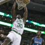 Brandon Bass throws down a dunk for 2 of his 9 points Friday night. (Matthew J. Lee/Globe staff) Topic: 20celtics Reporter: 