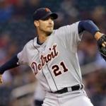 Detroit Tigers pitcher Rick Porcello throws against the Minnesota Twins in the first inning of a baseball game, Tuesday, Sept. 16, 2014, in Minneapolis. (AP Photo/Jim Mone)
