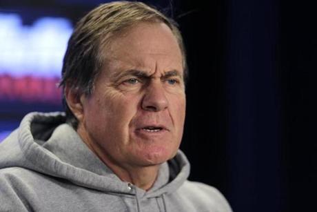 New England Patriots head coach Bill Belichick answers a reporter's question during a news conference prior to an NFL football practice in Foxborough, Mass., Wednesday, Dec. 17, 2014. (AP Photo/Charles Krupa)
