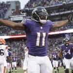 Dec 28, 2014; Baltimore, MD, USA; Baltimore Ravens wide receiver Kamar Aiken (11) celebrates after scoring a touchdown during the fourth quarter against the Cleveland Browns at M&T Bank Stadium. Mandatory Credit: Tommy Gilligan-USA TODAY Sports