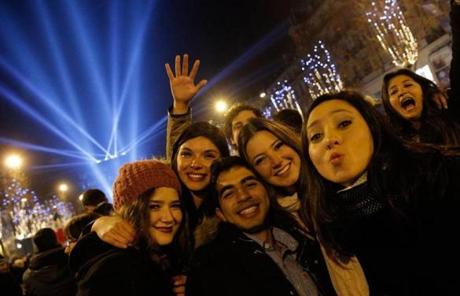 Revellers celebrated on the Champs Elysees in Paris.
