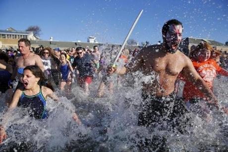Hundreds of people plunged into the Boston Harbor on Jan. 1.
