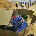 Students slept in two rickety cardboard villages in between games during the 10-hour Soccerthon.