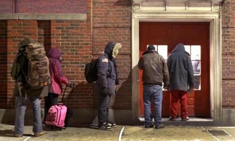 People waited to be admitted to the Boston Night Center one at a time shortly after the doors opened at 8:30 p.m. on Tuesday.
