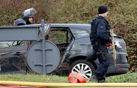 Armed police officers took position at the hostage situation in Dammartin-en-Goele.
