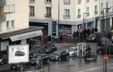 Meanwhile, police mobilized near the scene of a hostage situation at a kosher market in Paris on Friday.
