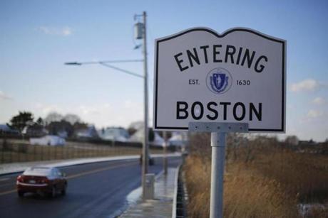 A sign marks the city boundary in Boston, Massachusetts January 9, 2015. Boston was selected on Thursday as the American candidate city that will bid to host the 2024 Olympics, taking the first strides in a grueling marathon to bring the Summer Games back to the United States for the first time since 1996. REUTERS/Brian Snyder (UNITED STATES - Tags: SPORT OLYMPICS)
