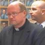 The Rev. John Delaney, pastor of Sacred Hearts, spoke at the press conference this morning.