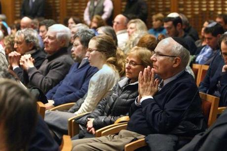 Attendees at a rally at Temple Beth Elohim in Wellesley Wednesday. 
