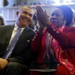 U.S. Rep. William Lacy Clay, D-Mo., left, smiles along side fellow Congressional Black Caucus member Rep. Shelia Jackson-Lee, D-Texas, during a service at Wellspring Church, Sunday, Jan. 18, 2015, in Ferguson, Mo. Several members of the caucus spoke during the service about Martin Luther King Jr., a day before a federal holiday honoring the civil rights leader, as well as their desire to reform police procedures after the death of Michael Brown and other fatal police shootings nationwide. (AP Photo/Jeff Roberson)