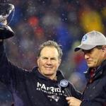 FOXBORO, MA - JANUARY 18: Head coach Bill Belichick of the New England Patriots holds up the Lamar Hunt Trophy after defeating the Indianapolis Colts in the 2015 AFC Championship Game at Gillette Stadium on January 18, 2015 in Foxboro, Massachusetts. The Patriots defeated the Colts 45-7. (Photo by Al Bello/Getty Images)