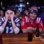 01/18/2015 - Boston, MA - Topic: 19patsfans - Indiana Colts fan Jack Cox, cq, of Nashville, TN (in blue) and Patriots fan Derek Keith, cq, of Hamilton, MA, watched the AFC playoffs matchup featuring their two teams while sipping beers at the Cask 'n Flagon (cq) in Boston on Sunday evening, January 18, 2015. The two met while in school at Indiana University. Story by Zolan Kanno-Youngs. Photo by Dina Rudick/Globe Staff.
