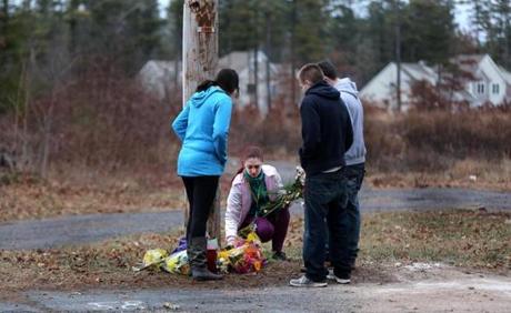  Friends left flowers on Wareham Street in Middleborough, where Nathan Childs?s Grand Jeep Cherokee crashed early Sunday morning.
