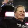 01/18/15: Foxborough, MA: Patriots head coach Bill Belichick smiles as he hoists the AFC Championship Trophy following New England's victory. The New England Patriots hosted the Indianapolis Colts in the AFC Championship Game at Gillette Stadium. (Globe Staff Photo/Jim Davis) section:sports topic:Patriots-Colts