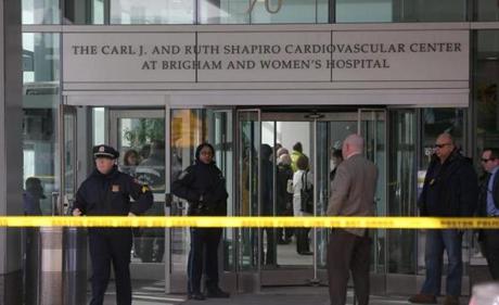 Police on Tuesday stood outside the entrance to the Shapiro Cardiovascular Center, where the shooting took place.
