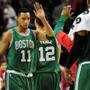 Evan Turner (11) received high-fives after he sank a 3-pointer with one second left.