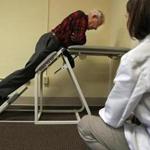 At Spaulding Hospital in Cambridge, Laura Ann Kurlinski assessed Richard Davenport, 90, for strength and flexibility.  Researchers are seeking ways to improve mobility in senior citizens.