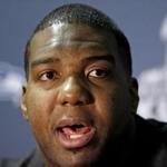 Seattle Seahawks' Russell Okung answers a question at a news conference for NFL Super Bowl XLIX football game Sunday, Jan. 25, 2015, in Phoenix. The Seahawks play the New England Patriots in Super Bowl XLIX on Sunday, Feb. 1, 2015. (AP Photo/David J. Phillip)