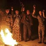 Kurdish civilians and fighters of the Kurdish People's Protection Units celebrated in Ras al-Ain.
