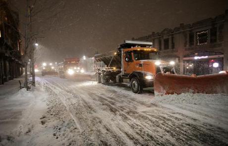 Heavy plows were at work in Coolidge Corner in Brookline last night.
