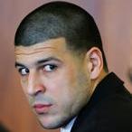 Carlos Ortiz is reported to be an associate of former Patriot Aaron Hernandez, charged in the murder of Odin Lloyd.