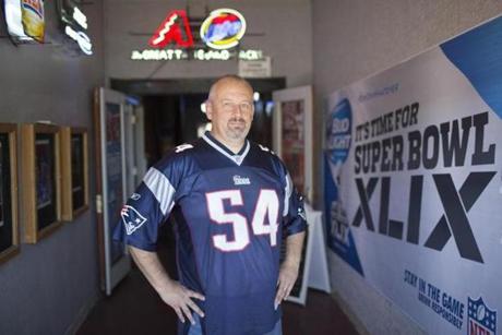 Michael Heiser, New England Patriots Fan and Massachusetts native, currently lives in Arizona. Here he is seen in Toso's Bar and Grill in North Phoenix, the official headquarters of the 300-member New England Patriots Fan Club. Finally they're back, but fans are still haunted by their last visit. (Kieran Kesner for The Boston Globe)
