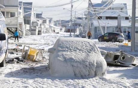 A car was covered on Oceanside Drive in Scituate Wednesday morning.
