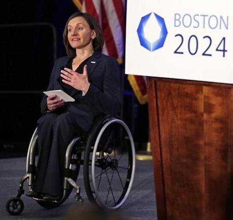 Cheri Blauwet, co-chair of the Boston 2024 Olympic and Paralympic Movement Committee, gestures as she addresses reporters during a news conference by organizers of Boston's campaign for the 2024 Summer Olympics in Boston, Wednesday, Jan. 21, 2015. The organizers released their 