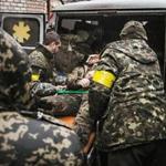  Ukrainian soldiers helped a wounded comrade get treatment at a hospital during clashes with pro-Russia separatists near Debaltseve Monday. Separatists have taken more territory from the government since unrest surged last month. AFP PHOTO / MANU BRABOMANU BRABO/AFP/Getty Images