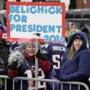New England Patriots fans wait for the start of a parade in Boston Wednesday, Feb. 4, 2015, to honor the Patriots' victory over the Seattle Seahawks in Super Bowl XLIX Sunday in Glendale, Ariz. (AP Photo/Steven Senne)