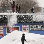 Snow was removed from the roof of Rotary Variety in South Boston last Sunday.