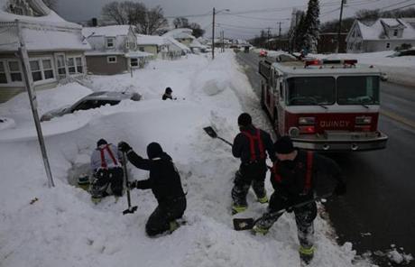 Quincy firefighters dug out a fire hydrant on Sea Street.
