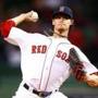 BOSTON, MA - SEPTEMBER 23: Clay Buchholz #11 of the Boston Red Sox pitches against the Tampa Bay Rays in the first inning during the game at Fenway Park on September 23, 2014 in Boston, Massachusetts. (Photo by Jared Wickerham/Getty Images)