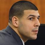 Aaron Hernandez listened to testimony during his trial on Wednesday.