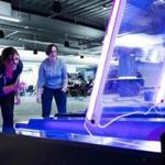 Aileen Noonan, left, and Alex Fram played skee-ball at the Waltham office of the online marketing company Constant Contact, where 40 percent of the workforce is in the 20 to 34 age group.