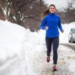 02/12/2015 NEWTON, MA Emily Bliss (cq) 29, runs along Vernon Street (cq) in Newton during her lunch break. (Aram Boghosian for The Boston Globe)