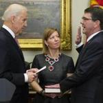 Ashton Carter, right, was sworn in as the new Defense Secretary by Vice President Joe Biden. 