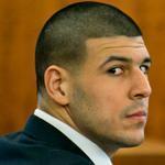 Aaron Hernandez listened during his murder trial on Wednesday.