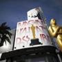 An Oscar statue is seen outside the Dolby Theater during preparations ahead of the 87th Academy Awards in Hollywood, California February 20, 2015. The Oscars will be presented at the Dolby Theater February 22, 2015. REUTERS/Lucy Nicholson (UNITED STATES - Tags: ENTERTAINMENT)