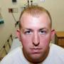 Ferguson police officer Darren Wilson during his medical examination after he fatally shot Michael Brown.  