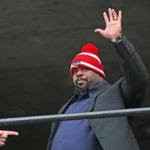 BOSTON, MA - 1/26/2015: Patriot Vince Wilfork, gives fans a wave.....Mayor Martin J. Walsh hosted a sendoff rally Monday on City Hall Plaza for the New England Patriots featuring the head coach, team captains, and cheerleaders. Before they leave for the Super Bowl XLIX in Glendale, Ariz.,. Patriots chairman and CEO Robert Kraft, President Jonathan Kraft, and head coach Bill Belichick. Patriots captains Tom Brady, Dan Connolly, Vince Wilfork, Devin McCourty and Matthew Slater will address supporters on the upcoming game, which is slated for Feb. 1. (David L Ryan/Globe Staff Photo) SECTION: METRO TOPIC 27patsrally(1)
