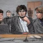 A courtroom sketch depicts Dzhokhar Tsarnaev (center) during his trial on Thursday between defense attorneys Miriam Conrad (left) and Judy Clarke (right). 