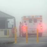 An Okaloosa County ambulance sits at the Eglin Air Force entrance in Fort Walton Beach, Fla., on Wednesday.
