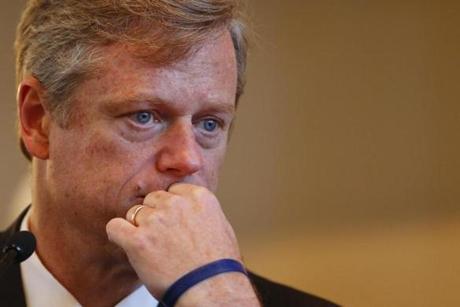 Boston, Massachusetts -- 09/24/2014-- Candidate for Governor Charlie Baker watches a question on a video monitor during a debate focused on human services at Faneuil Hall in Boston, Massachusetts September 24, 2014. Jessica Rinaldi/Globe Staff Topic: 25debate Reporter: 
