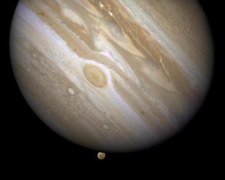 Jupiter is shown with its biggest moon, Ganymede (bottom). It is estimated the ocean is 60 miles thick.
