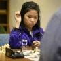 Chess master Carissa Yip, at a game at the Billerica Chess Club, started playing at age 6.