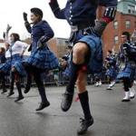 Members of the Berkeley Preparatory School Pipe and Drum Corps from Tampa, Fla., showed their moves in the parade. 