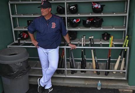 Fort Myers, FL - 03/03/15 - Boston Red Sox manager John Farrell (53) in the team dugout. Red Sox Spring Training Game 1 vs. Northeastern University at Jet Blue Park. (Barry Chin/Globe Staff), Section: Sports, Reporter: Peter Abraham, Topic: 04Red Sox, LOID: 8.0.2826364469. 
